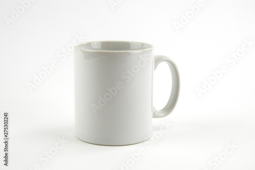 Blank white mug on isolated white background