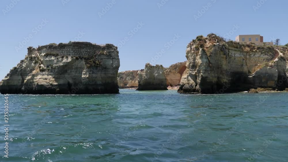 Beautiful seascape of Algarve on a sunny day. Portugal. Panoramic plane Beautiful seascape of Algarve on a sunny day. Portugal. Panoramic plane