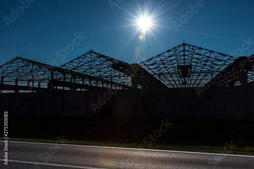 Roof structure of abandoned factory, silhouette