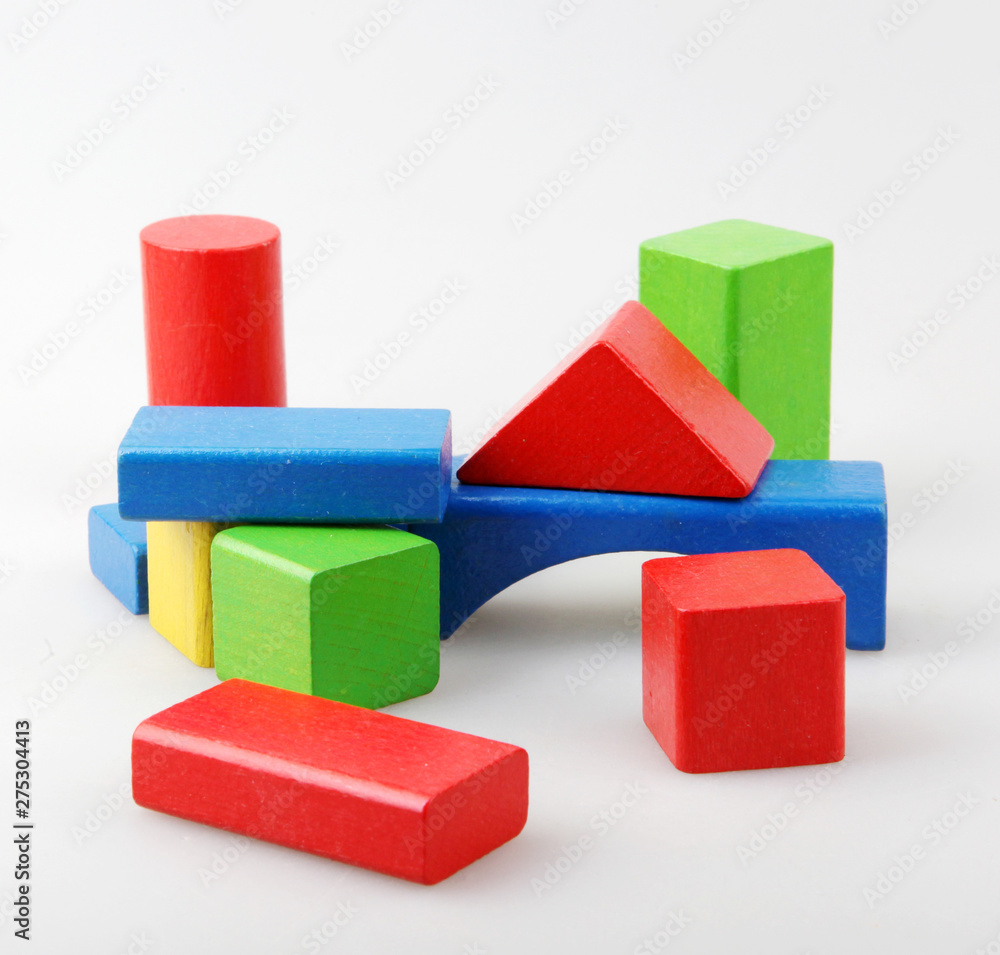 Studio Shot Of Colorful Toy Blocks Against White Background