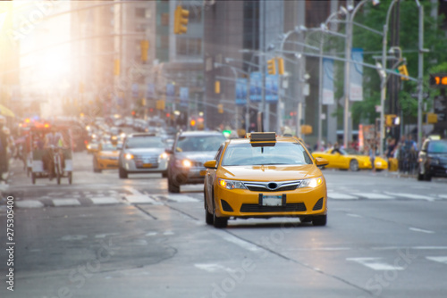 Yellow Taxi Driving Through the Streets of New York City