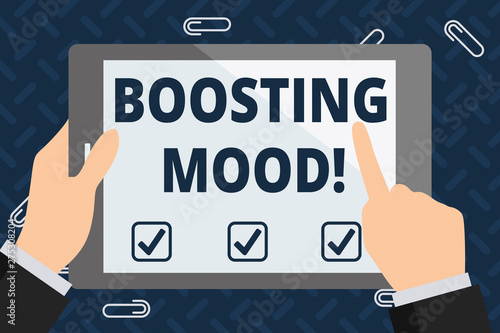 Text sign showing Boosting Mood. Business photo showcasing To make someone feel more positive or more confident Businessman Hand Holding, Pointing and Touching Colorful Tablet Blank Screen