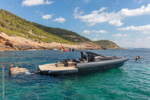 people in relax on theinflatable motor boat in formentera, spain © Andrea