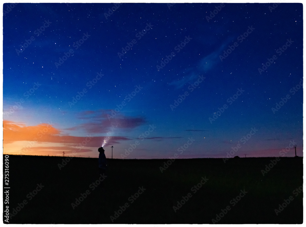 silhouette of man on the background of blue sky