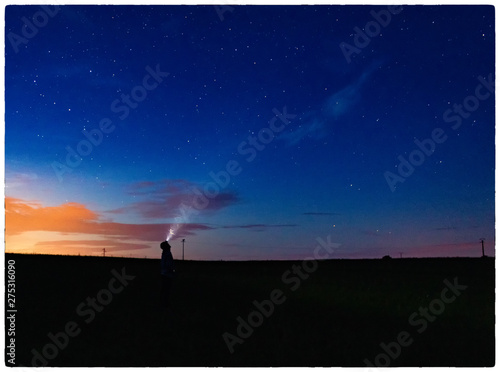 Fototapeta Naklejka Na Ścianę i Meble -  silhouette of man on the background of blue sky
