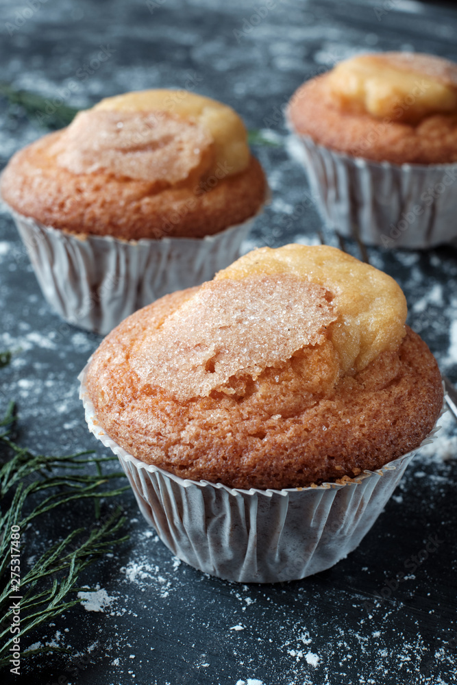 Homemade muffins on black table Homemade muffins on black table