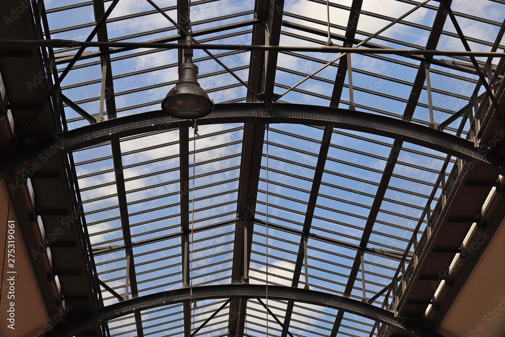 Ceiling of a train station made of steel and glass Ceiling of a train station made of steel and glass