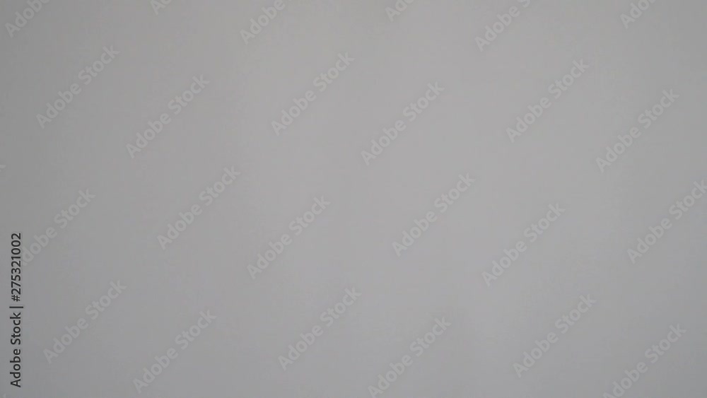 White rice falling on white background White rice falling on white background
