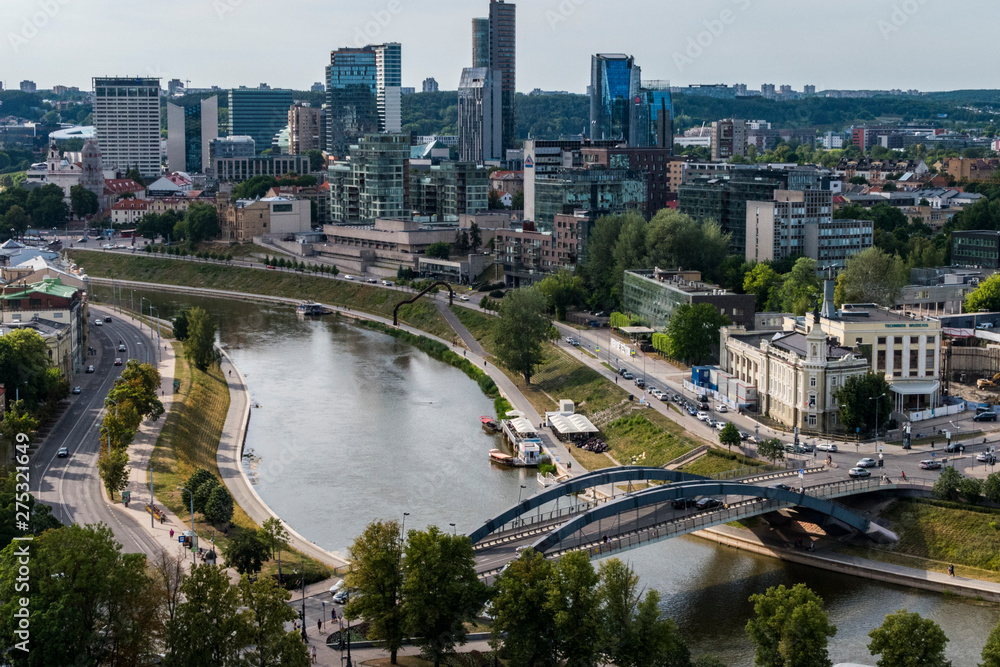 Vilnius, Lithuania A view over the modern downtown of the capital and the Neris River. Vilnius, Lithuania A view over the modern downtown of the capital and the Neris River.