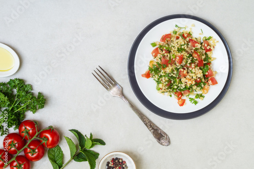 Lebanese traditional salad taboule soaked bulgur and ingredients