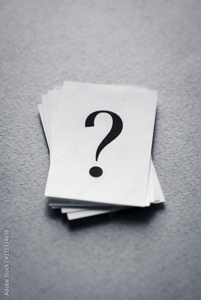 Paper card with a question mark Paper card with a question mark