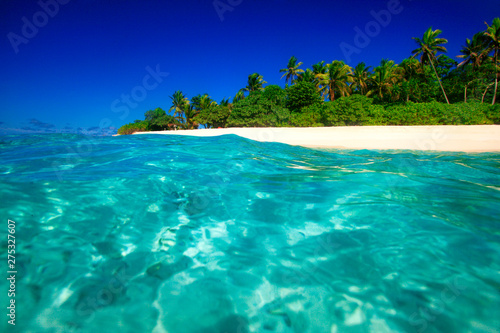 Fototapeta Naklejka Na Ścianę i Meble -  Tropical Island with a paradise beach and palm trees