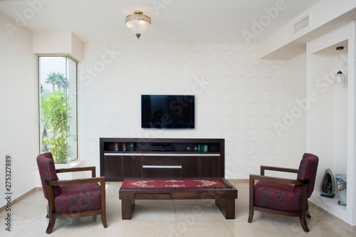 Flat screen television in small living room photo