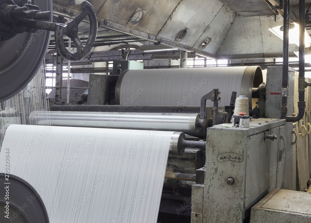 Industrial loom in textile factory Industrial loom in textile factory