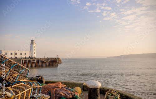Scarborough lighthouse and lobster pots.