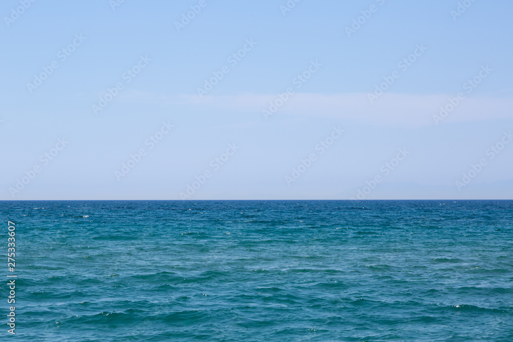 Blue sky with clouds over sea. Nature composition.