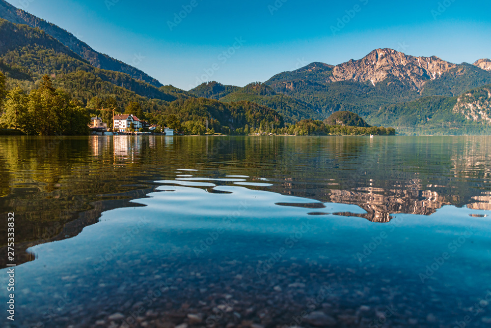 Beautiful alpine morning view with reflections at the famous Kochelsee - Bavaria - Germany