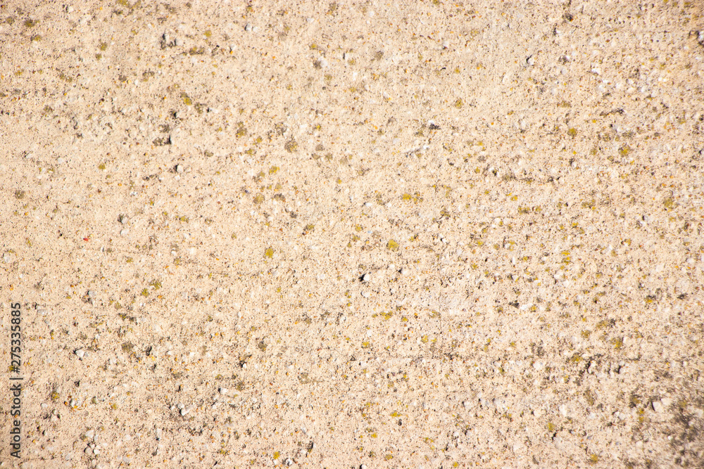 Beige painted grunge wall rough texture Beige painted grunge wall rough texture