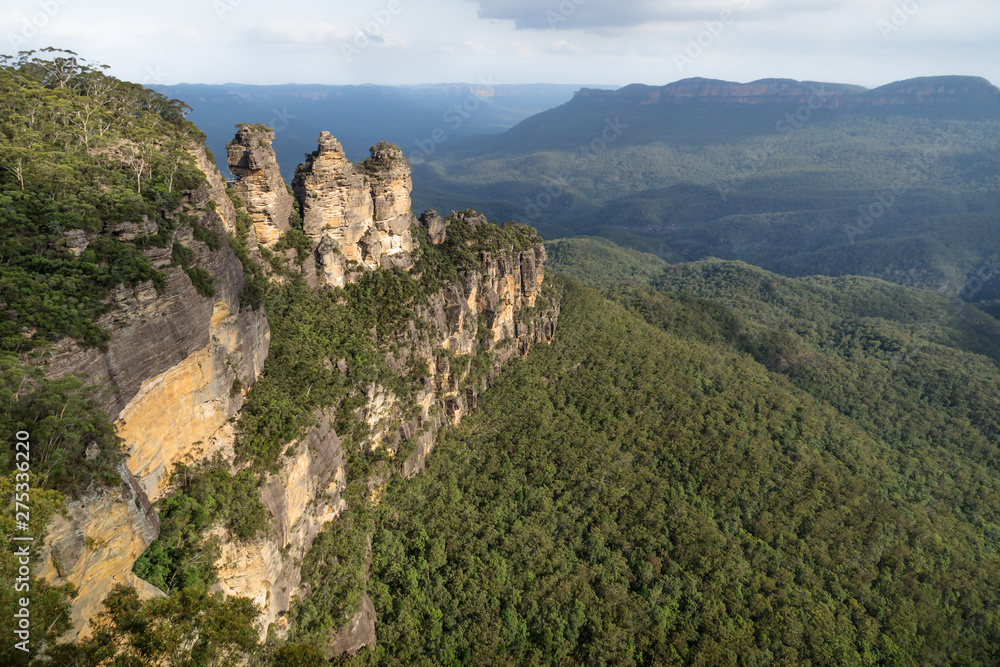 Three sisters rock formation with last sunlight in the Blue Mountains, Katoomba, New South Wales, Australia Three sisters rock formation with last sunlight in the Blue Mountains, Katoomba, New South Wales, Australia