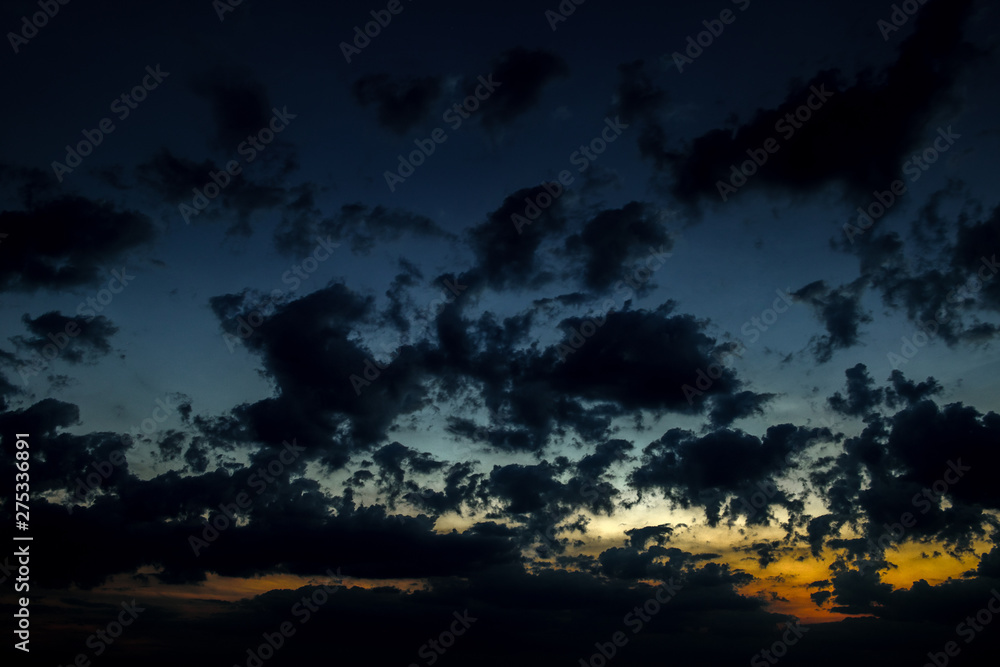 Dark sky with clouds at sunset Dark sky with clouds at sunset