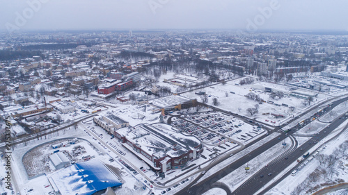 Riga City white winter car parking with cars in town photo