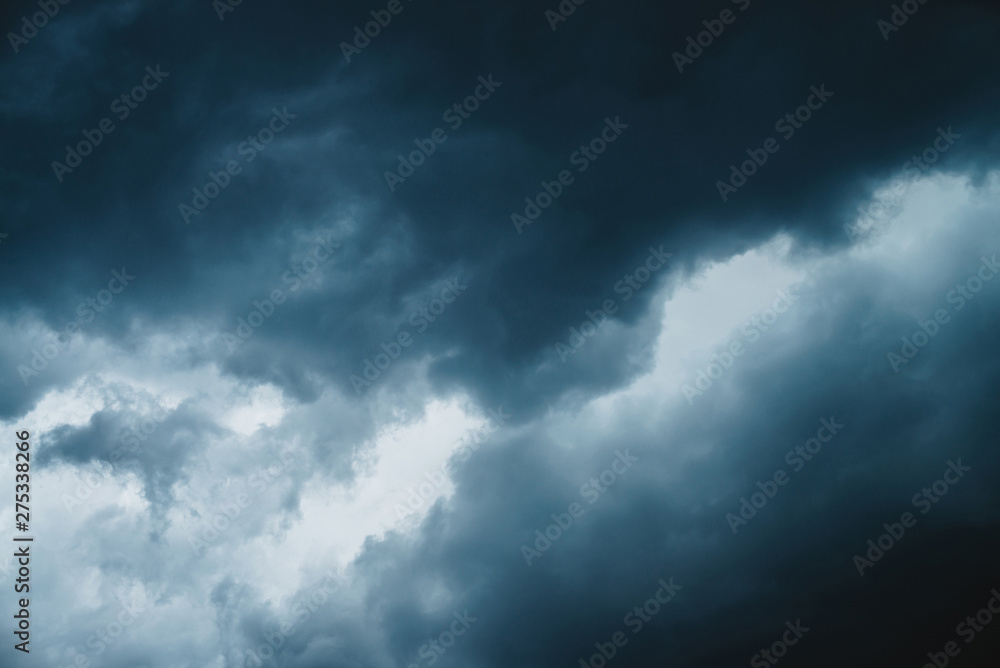 Dramatic cloudscape texture. Dark heavy thunderstorm clouds before rain. Overcast rainy bad weather. Storm warning. Natural blue background of cumulonimbus. Nature backdrop of stormy cloudy sky. Dramatic cloudscape texture. Dark heavy thunderstorm clouds before rain. Overcast rainy bad weather. Storm warning. Natural blue background of cumulonimbus. Nature backdrop of stormy cloudy sky.