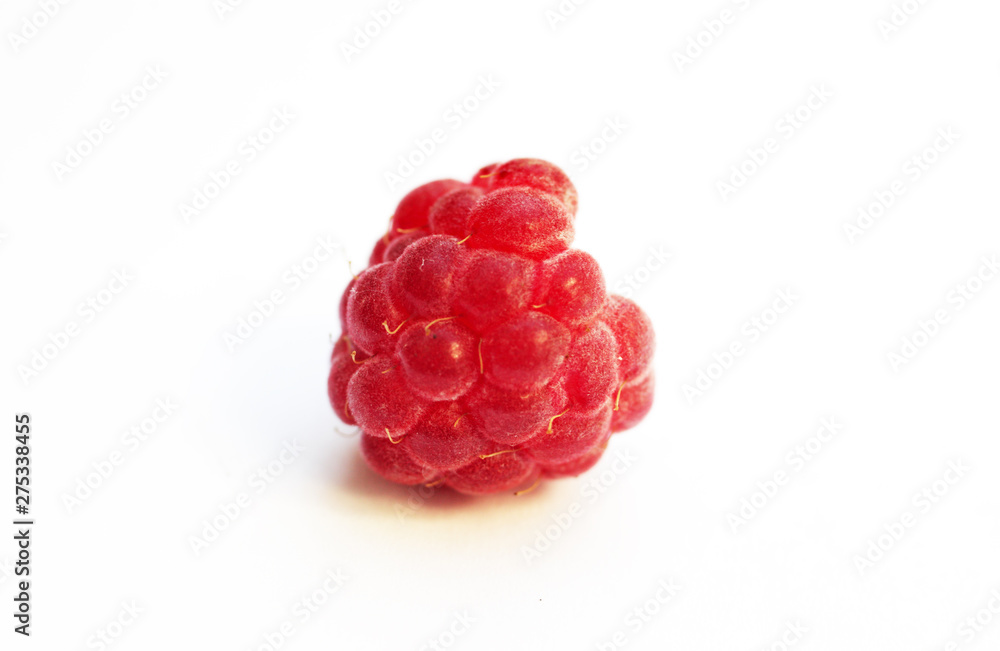 Raspberry on white background macro Raspberry on white background macro