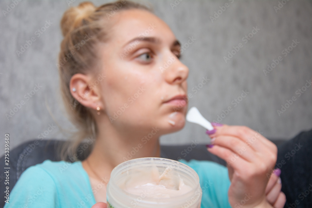 Spa Woman applying Facial clay Mask. Beauty Treatments.facial cleansing, cosmetology, beauty mask Spa Woman applying Facial clay Mask. Beauty Treatments.facial cleansing, cosmetology, beauty mask