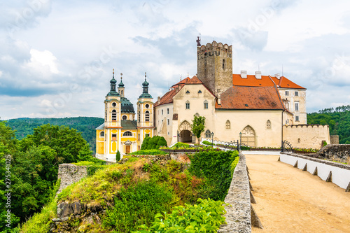 View of beautiful castle Vranov nad Dyji  Moravian region in Czech republic. Ancient chateau built in baroque style  placed on big rock above river near the Vranov village. Cloudy weather.