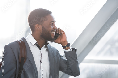 Waiting for Departure. Businessman Making Phone Call