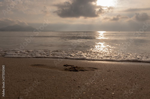 Fussabdruck im Sand am Meer