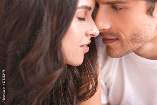 Tender man and woman bonding, close up