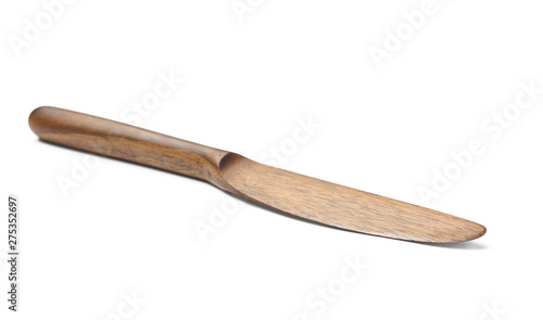 New wooden butter knife on white background photo