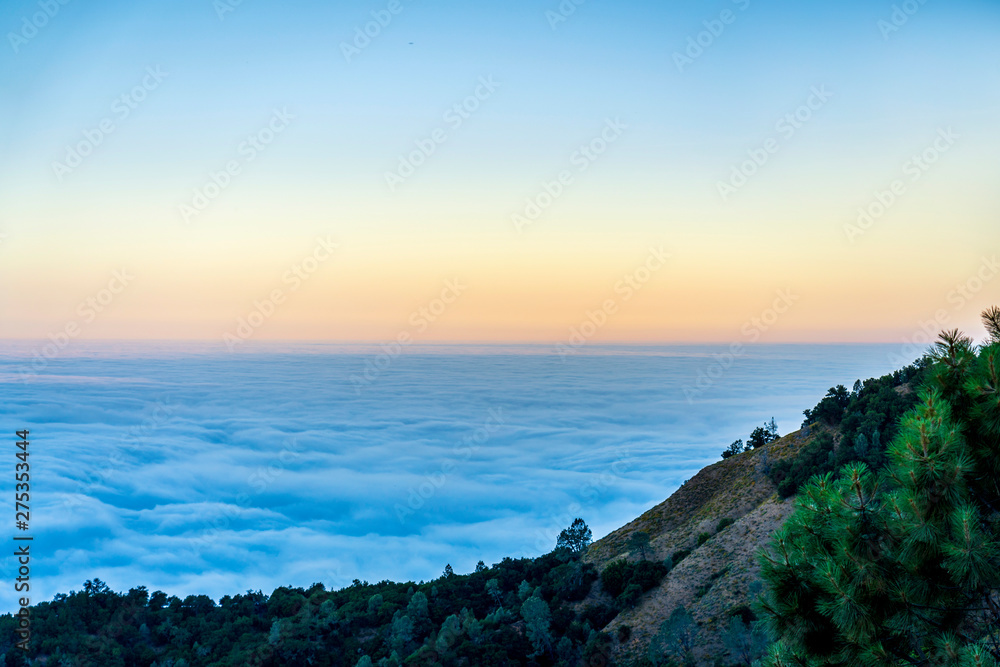 Panorama of Clouds over Ocean in Mountains