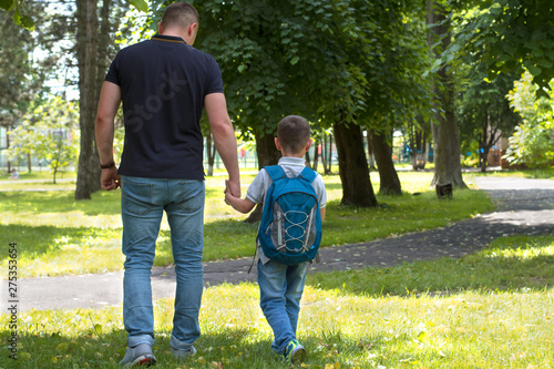 father walks with his son