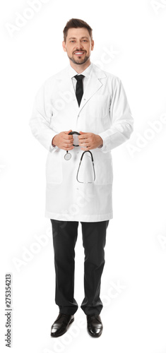 Full length portrait of smiling male doctor isolated on white. Medical staff