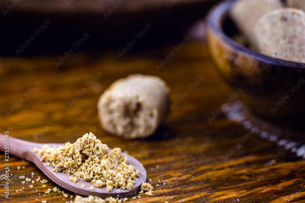 Paçoca ground in a wooden spoon, typical Brazilian peanut candy. Food from Brazil made in the northeast and in the state of Minas Gerais. Paçoca ground in a wooden spoon, typical Brazilian peanut candy. Food from Brazil made in the northeast and in the state of Minas Gerais.