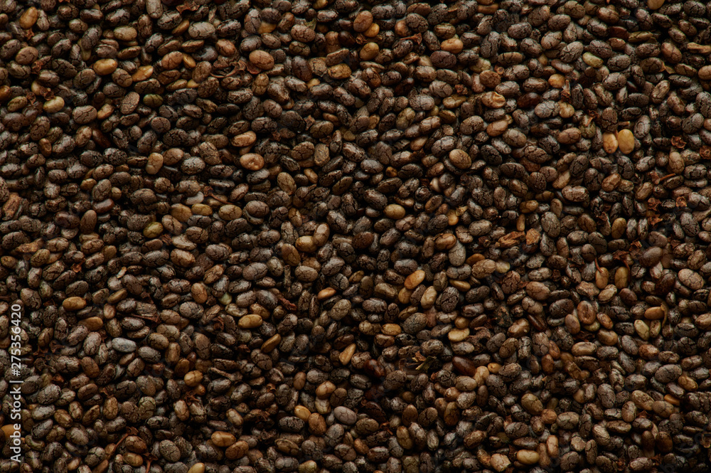 Brown chia seeds texture background Brown chia seeds texture background
