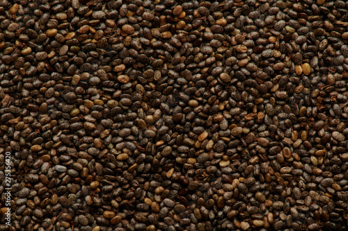 Brown chia seeds texture background
