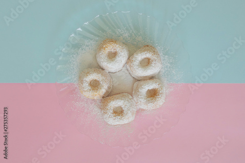 Mini Cakes isolated on a Blue and Pink Background