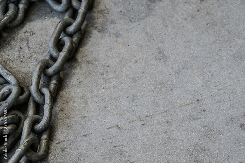 Chain on Textured Cement