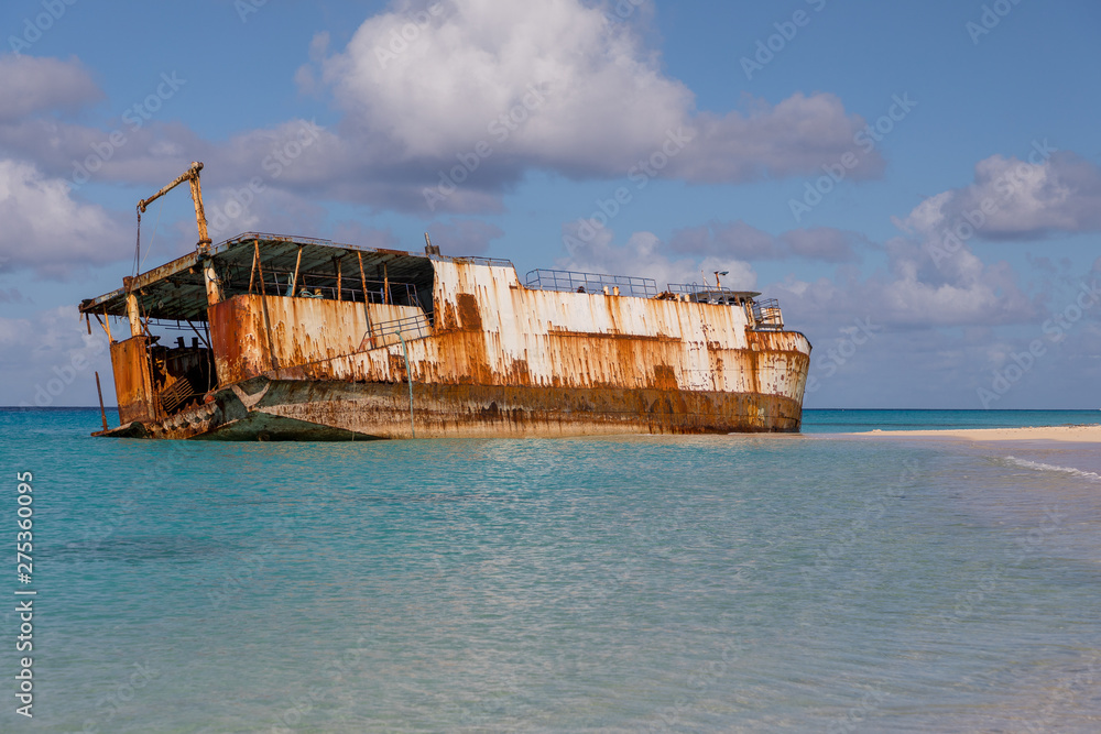 Shipwreck on shoreline in Caribbean sea
