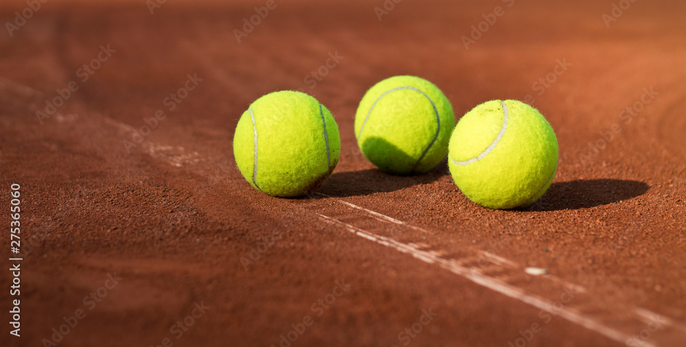 Tennis game. Tennis balls on the tennis court. Sport, recreation concept