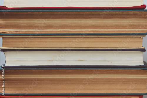 Stack of multicolored books closeup  education  reading  back to school concept 