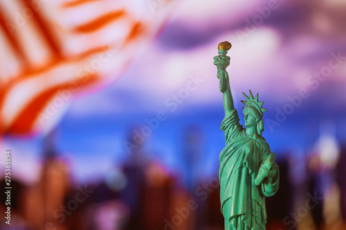 Statue of Liberty with flag of the United States of America New York City © ungvar
