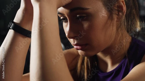Wallpaper Mural Athletic Girl in sportswear tired exhausted disappointed after sports activities, Exercise. Real emotions, the process of training, sporting achievements and failures Torontodigital.ca