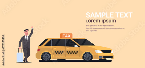 businessman catching taxi on street business man in formal wear with luggage stopping yellow cab city transportation service concept copy space full length flat horizontal