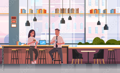 couple sitting on chair at bar counter with laptop coffee break concept business man woman drinking cappuccino during meeting modern cafe interior flat full length horizontal