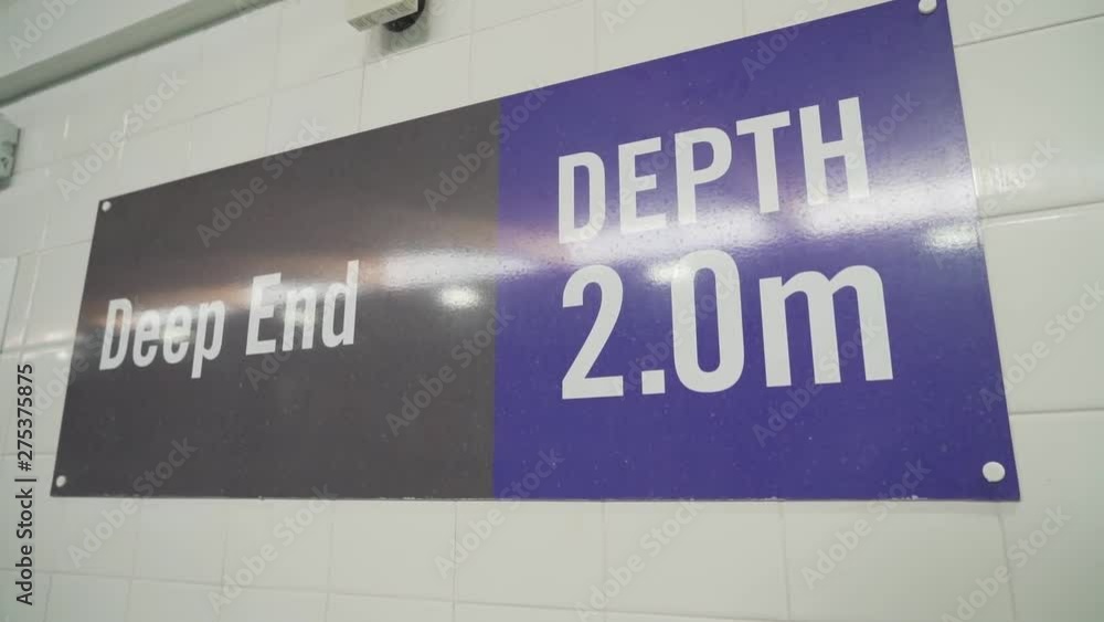Deep end signage in a swimming centre. Deep end signage in a swimming centre.
