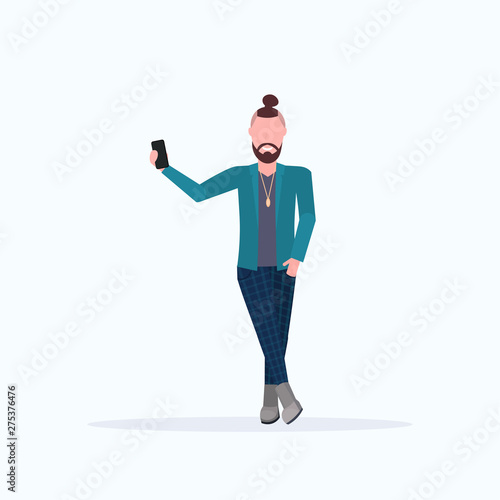 man taking selfie photo on smartphone camera casual male cartoon character posing white background flat full length